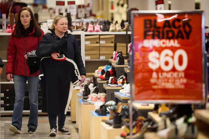 People shop at Macy&#39;s Herald Square during Black Friday sales in New York City, U.S., November 25, 2022. REUTERS/Brendan McDermid