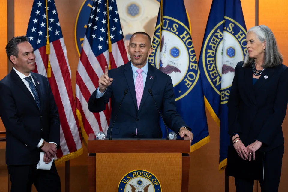 Rep. Hakeem Jeffries, D-N.Y., flanked by Rep. Katherine Clark, D-Mass., (right) and Rep. Pete Aguilar, D-Calif., (left) speaks on Capitol Hill Wednesday after being elected as the new Democratic House leader. (Michael A. McCoy/Reuters) (Bill Clark/CQ-Roll Call, Inc via Getty Images)