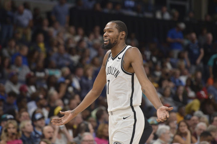 Brooklyn Nets forward Kevin Durant (7) reacts in the second half of an NBA basketball game against the Memphis Grizzlies Monday, Oct. 24, 2022, in Memphis, Tenn. (AP Photo/Brandon Dill)