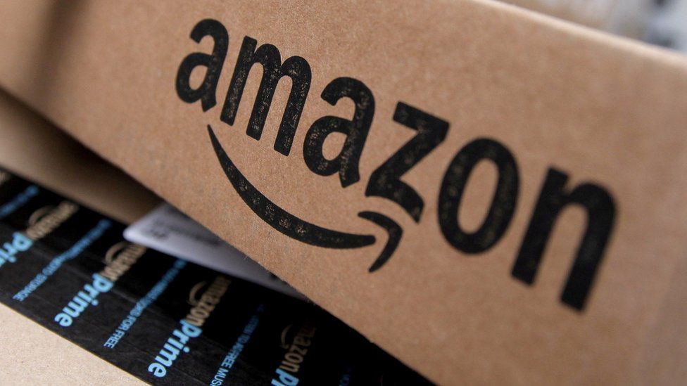 Amazon warns of slower sales as economy weakens - BBC News