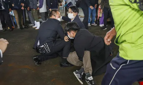 Japan PM evacuated unharmed after explosion following suspected attack