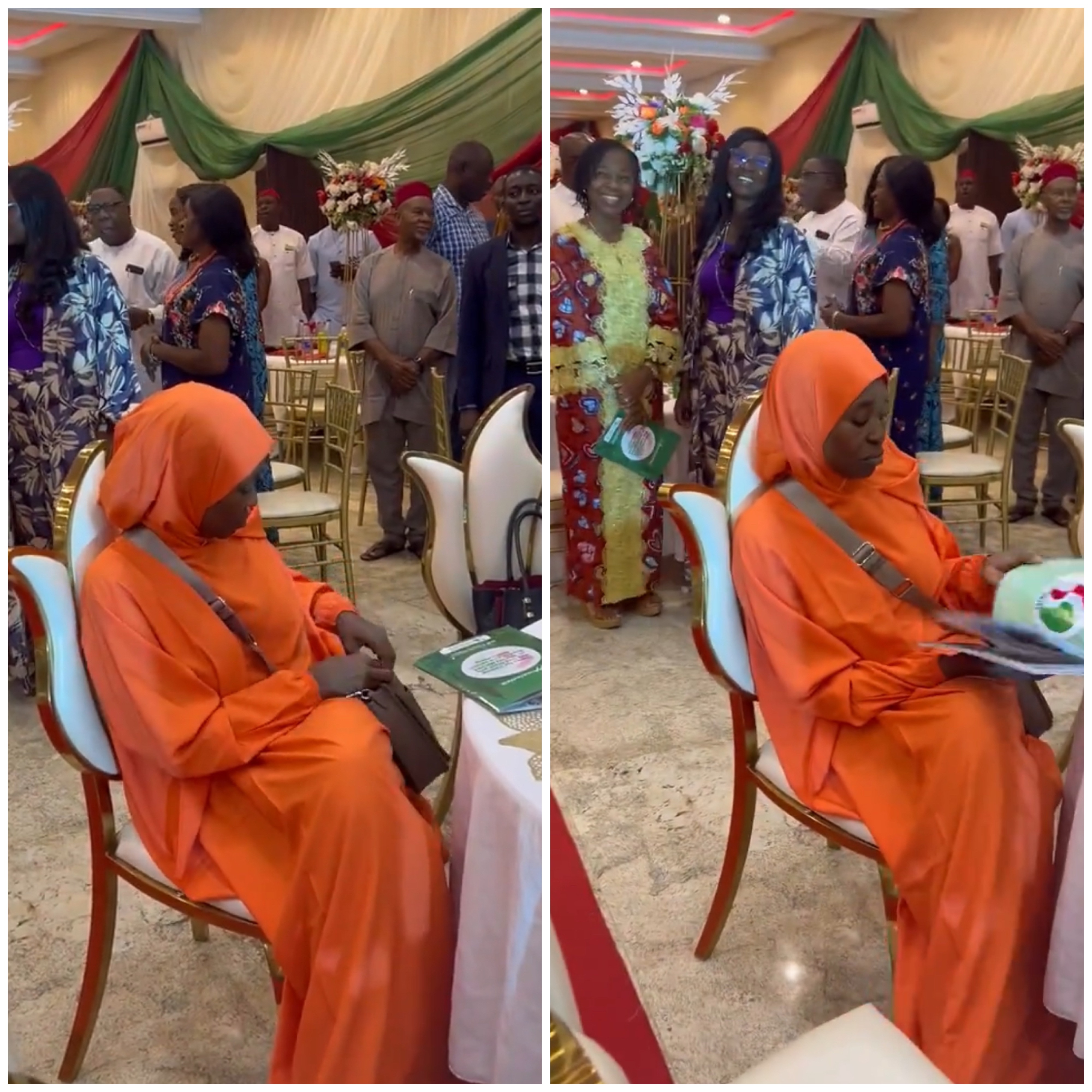 Activist, Aisha Yesufu, refuses to stand up during the recitation of the new national anthem at an event (video)