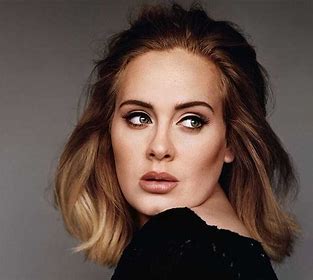 Adele announces break from music