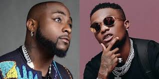 Drama as Davido and Wizkid snub each other at a club in London; netizens react (Video)