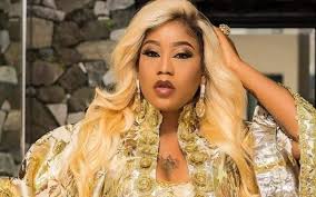 Toyin Lawani claps back at troll who criticized her daughter ‘liposuction costume’(PHOTOS)